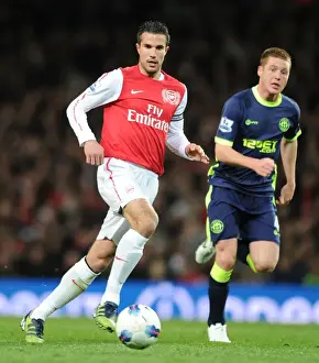Arsenal V Wigan Athletic 2011-12 Prints: Arsenal's Robin van Persie Tackles Wigan's James McCarthy in 2011-12 Premier League Clash