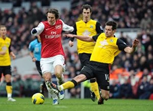 Arsenal v Blackburn Rovers 2011-12 Collection: Arsenal's Rosicky Clashes with Blackburn's Dann in Premier League Showdown