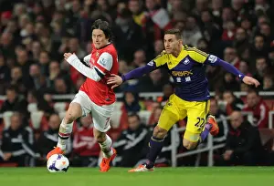 Arsenal V Swansea City 2013-14 Prints: Arsenal's Rosicky Clashes with Swansea's Rangel in Premier League Showdown