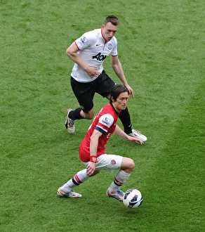 Arsenal V Manchester United 2012-13 Prints: Arsenal's Rosicky Faces Off Against Manchester United's Jones: A Premier League Showdown