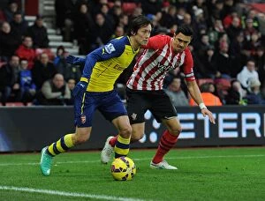 Southampton v Arsenal 2014-15 Collection: Arsenal's Rosicky Fends Off Southampton's Fonte in Premier League Clash (January 2015)