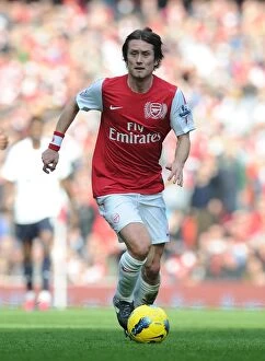 Images Dated 26th February 2012: Arsenal's Rosicky Fights Bravely Against Tottenham in Intense Premier League Showdown (2011-12)