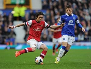 Everton v Arsenal 2013/14 Collection: Arsenal's Rosicky Outmaneuvers Everton's Barkley in Premier League Clash