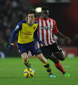 Southampton V Arsenal 2014-15 Prints: Arsenal's Rosicky Outmaneuvers Southampton's Wanyama in Premier League Clash (Southampton v Arsenal 2014-15)