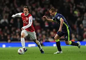 Arsenal's Rosicky Outmaneuvers Wigan's McCarthy in 2011-12 Premier League Clash