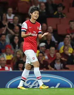 Arsenal V Fenerbahce 2013-14 Prints: Arsenal's Roy Miyaichi in Action against Fenerbahce in 2013-14 UEFA Champions League Play-offs