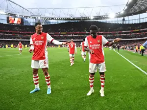 Arsenal's Saka and Gabriel Celebrate Second Goal Against Brentford (2021-22)
