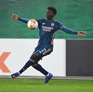 Rapid Vienna V Arsenal 2020-21 Prints: Arsenal's Saka Shines: Rapid Vienna vs Arsenal, UEFA Europa League 2020-21