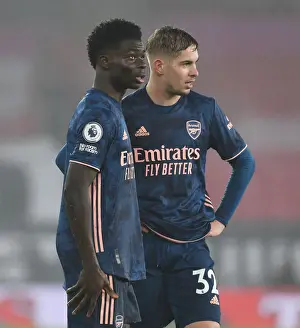Arsenal's Saka and Smith Rowe in Action at Empty Southampton Stadium (Southampton v Arsenal, 2021-22 Premier League)