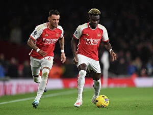 Images Dated 28th December 2023: Arsenal's Saka and White in Action against West Ham United (2023-24)