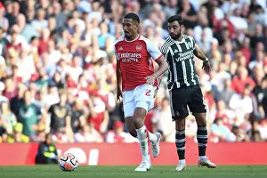 Arsenal's Saliba Chases Victory: Arsenal FC vs Manchester United, Premier League 2023-24