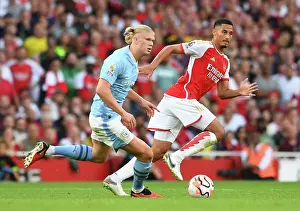 Arsenal's Saliba Faces Haaland Pressure: Arsenal FC vs Manchester City, 2023-24 Premier League