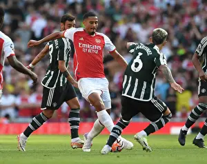 Arsenal's Saliba Takes on Manchester United's Martinez in Premier League Showdown (2023-24)