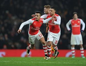 Images Dated 4th January 2015: Arsenal's Sanchez and Oxlade-Chamberlain Celebrate FA Cup Goals vs Hull City (2014-15)
