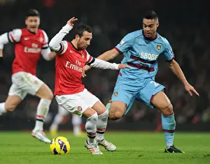 Arsenal's Santi Cazorla Clashes with West Ham's Winston Reid in Premier League Showdown