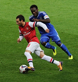 Arsenal V Chelsea - Capital One Cup 4th Rd 2013-14 Prints: Arsenal's Santi Cazorla Outmaneuvers Chelsea's Michael Essien
