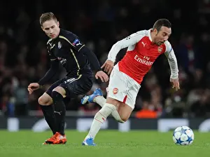 Arsenal V Dinamo Zagreb 2015-16 Prints: Arsenal's Santi Cazorla Outshines Marko Rog: A Dazzling Moment from the 2015-16 Champions League Clash