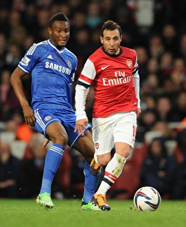 Arsenal V Chelsea - Capital One Cup 4th Rd 2013-14 Prints: Arsenal's Santi Cazorla vs
