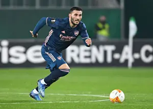 Rapid Vienna V Arsenal 2020-21 Prints: Arsenal's Sead Kolasinac in Action against Rapid Vienna in UEFA Europa League Group Stage