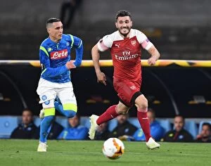Napoli v Arsenal 2018-19 Collection: Arsenal's Sead Kolasinac Breaks Past Napoli's Jose Callejon in Europa League Quarterfinal