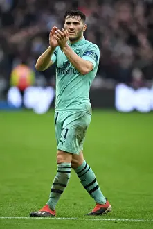 Arsenal's Sead Kolasinac Celebrates with Fans after West Ham Victory