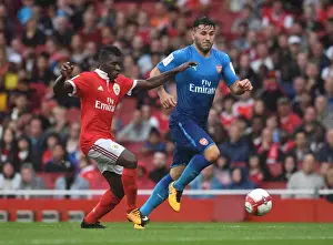 Arsenal V Benfica - Emirates Cup 2017-18 Prints: Arsenal's Sead Kolasinac Clashes with Benfica's Buta in Emirates Cup Showdown