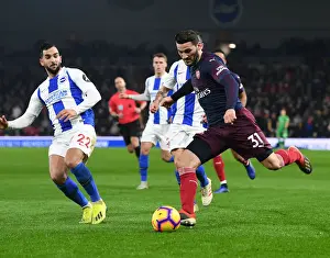 Arsenal's Sead Kolasinac Clashes with Brighton's Martin Montoya in Premier League Showdown
