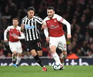 Arsenal V Newcastle United 2018-19 Prints: Arsenal's Sead Kolasinac Surges Past Newcastle's Ayoze Perez in Premier League Clash