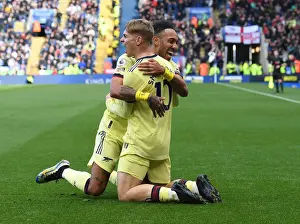 Arsenal's Smith Rowe and Aubameyang Celebrate Double Strike: Arsenal's 2-0 Victory over Leicester City (2021-22)