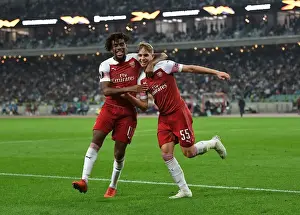 Qarabag V Arsenal 2018-19 Prints: Arsenal's Smith Rowe and Iwobi: Dynamic Duo Celebrates Goals in Qarabag Victory