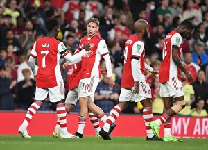 Arsenal's Smith Rowe and Saka Celebrate Goals Against AFC Wimbledon in Carabao Cup