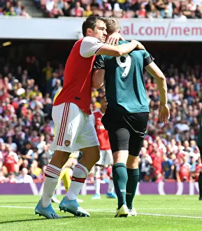 Arsenal V Burnley 2019-20 Prints: Arsenal's Sokratis Embraces Burnley's Chris Wood in Premier League Clash