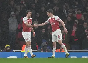 Arsenal's Sokratis and Koscielny: A Defensive Duo in Action against Manchester United (2018-19)