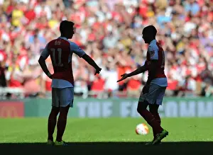 Arsenal's Star Duo: Ozil and Walcott Shine at the FA Community Shield vs. Chelsea (2015)