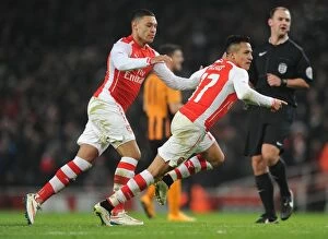 Images Dated 4th January 2015: Arsenal's Star Duo: Sanchez and Oxlade-Chamberlain Celebrate FA Cup Goals vs Hull City