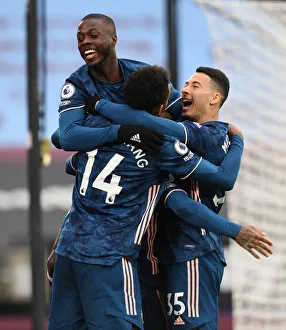 Arsenal's Star Forwards: Lacazette, Pepe, Aubameyang, and Martinelli Celebrate Goals Against West Ham