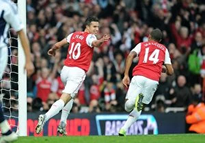 Arsenal v West Bromwich Albion 2011-12 Collection: Arsenal's Star Strikers: Robin van Persie and Theo Walcott Celebrate First Goal in 3-0 Premier