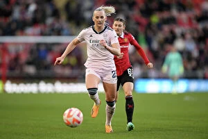 Images Dated 20th April 2023: Arsenal's Stina Blackstenius Faces Off Against Manchester United's Hannah Blundell in FA Women's