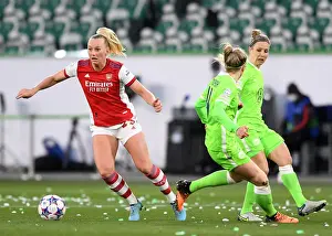 VfL Wolfsburg V Arsenal Women 2021-22 Prints: Arsenal's Stina Blackstenius Goes Head-to-Head with VfL Wolfsburg in Champions League Quarterfinal