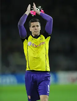 Borussia Dortmund V Arsenal 2013-14 Prints: Arsenal's Szczesny Applauding Dortmund Fans: Borussia Dortmund vs Arsenal