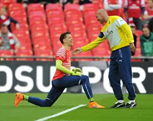 Arsenal's Szczesny and Bould Share a Light-Hearted Moment Before FA Cup Semi-Final vs. Reading