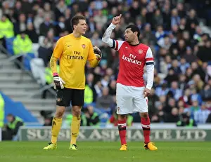 Brighton And Hove Albion V Arsenal FA Cup 2012-13 Prints: Arsenal's Szczesny and Santos Prepare for FA Cup Clash against Brighton & Hove Albion