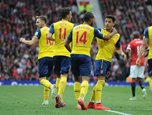 Manchester United V Arsenal 2014-15 Prints: Arsenal's Theo Walcott and Alexis Sanchez Celebrate Goal Against Manchester United