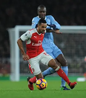 Arsenal V Stoke City 2016-17 Prints: Arsenal's Theo Walcott Fends Off Stoke's Giannelli Imbula During Premier League Clash