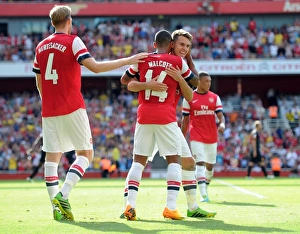 Arsenal V Galatasaray 2013-14 Prints: Arsenal's Theo Walcott, Per Mertesacker