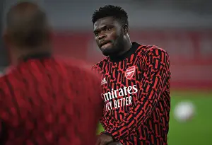 Arsenal's Thomas Partey Prepares for Aston Villa Clash in Empty Emirates Stadium (2020-21)