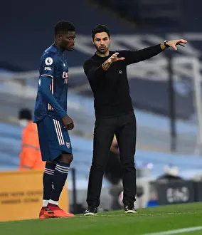 Manchester City V Arsenal 2020-21 Prints: Arsenal's Thomas Partey Receives Instructions from Mikel Arteta during Manchester City Clash