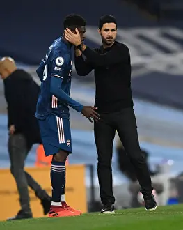 Manchester City V Arsenal 2020-21 Prints: Arsenal's Thomas Partey Receives Strategic Guidance from Mikel Arteta during Manchester City Match (2020-21)