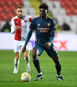 Slavia Prague V Arsenal 2020-21 Prints: Arsenal's Thomas Partey in UEFA Europa League Quarterfinal Match against Slavia Praha in Prague