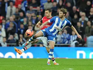 Arsenal's Thomas Vermaelen Faces Off Against Wigan's Nick Powell in FA Cup Semi-Final Showdown